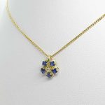 Catenina con pendente fiore oro diamante e zaffiri