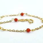 Braccialetto oro giallo con corallo
