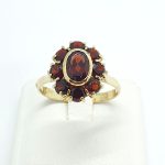 Anello margherita oro con granati